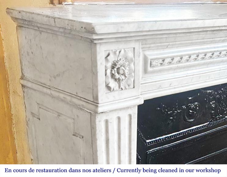 Louis XVI style fireplace in Carrara marble, decorated with ribbons and floral rosettes-3