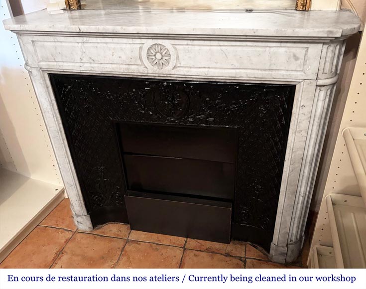 Louis XVI style fireplace with rounded corners, decorated with a daisy, in Carrara marble-4