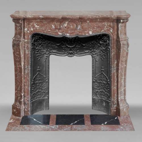 Louis XV style Pompadour model fireplace, in Rouge du Nord marble