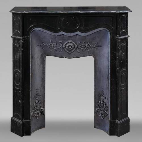Louis XV style Pompadour model fireplace in speckled black marble