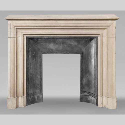 Louis XIV style stone fireplace from the 1950s