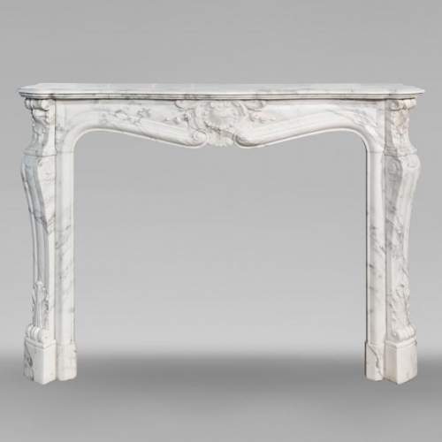 Large Louis XV style fireplace in Arabescato marble, decorated with shells