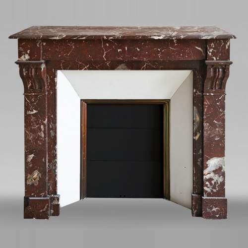 Napoleon III style fireplace, modillion type, in northern red marble