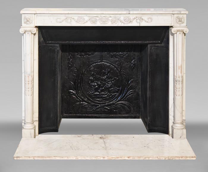 Louis XVI style fireplace in semi-statuary marble, featuring columns and Ionic capitals-0