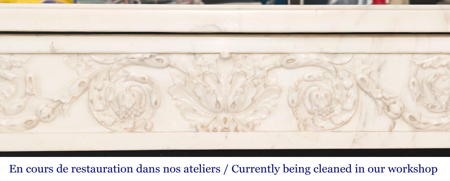 Louis XVI style fireplace in semi-statuary marble, featuring columns and Ionic capitals-1