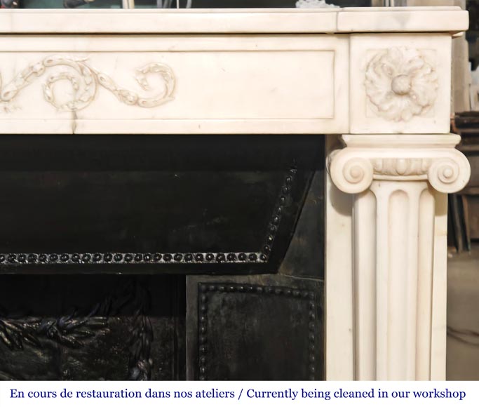 Louis XVI style fireplace in semi-statuary marble, featuring columns and Ionic capitals-10