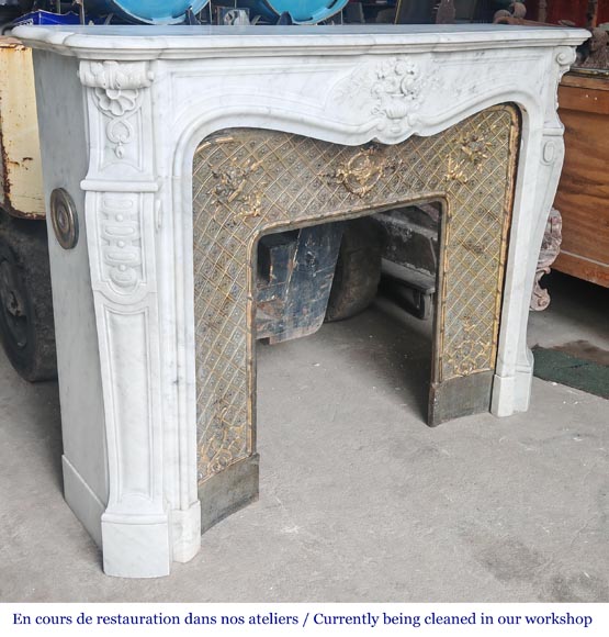 Louis XV style fireplace in Carrara marble, decorated with a vase of flowers Louis XV style fireplace in Carrara marble, decorated with a vase of flowers-5
