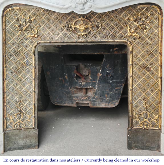 Louis XV style fireplace in Carrara marble, decorated with a vase of flowers Louis XV style fireplace in Carrara marble, decorated with a vase of flowers-12