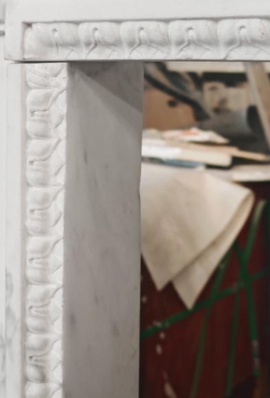 A Louis XVI period fireplace in veined Carrara marble, decorated with a Greek-style frieze. A Louis XVI period fireplace in veined Carrara marble, decorated with a Greek-style frieze.-5