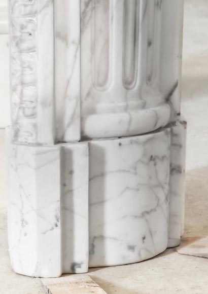 A Louis XVI period fireplace in veined Carrara marble, decorated with a Greek-style frieze. A Louis XVI period fireplace in veined Carrara marble, decorated with a Greek-style frieze.-8