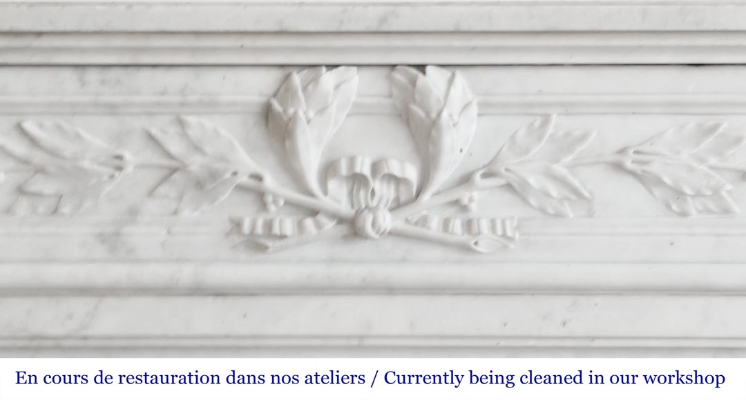 Louis XVI style fireplace with rounded corners and decorated with a laurel wreath, in Carrara marble Louis XVI style fireplace with rounded corners and decorated with a laurel wreath, in Carrara marble-1