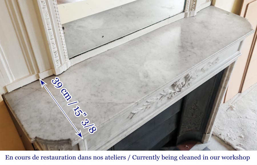 Louis XVI style fireplace with rounded corners and decorated with a laurel wreath, in Carrara marble Louis XVI style fireplace with rounded corners and decorated with a laurel wreath, in Carrara marble-12