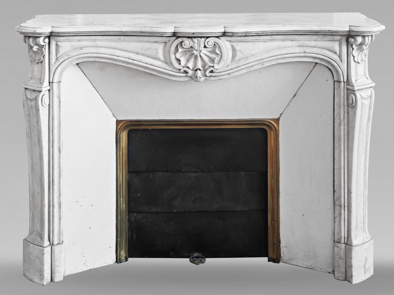 Louis XV style fireplace in Carrara marble decorated with a shell Louis XV style fireplace in Carrara marble decorated with a shell-0