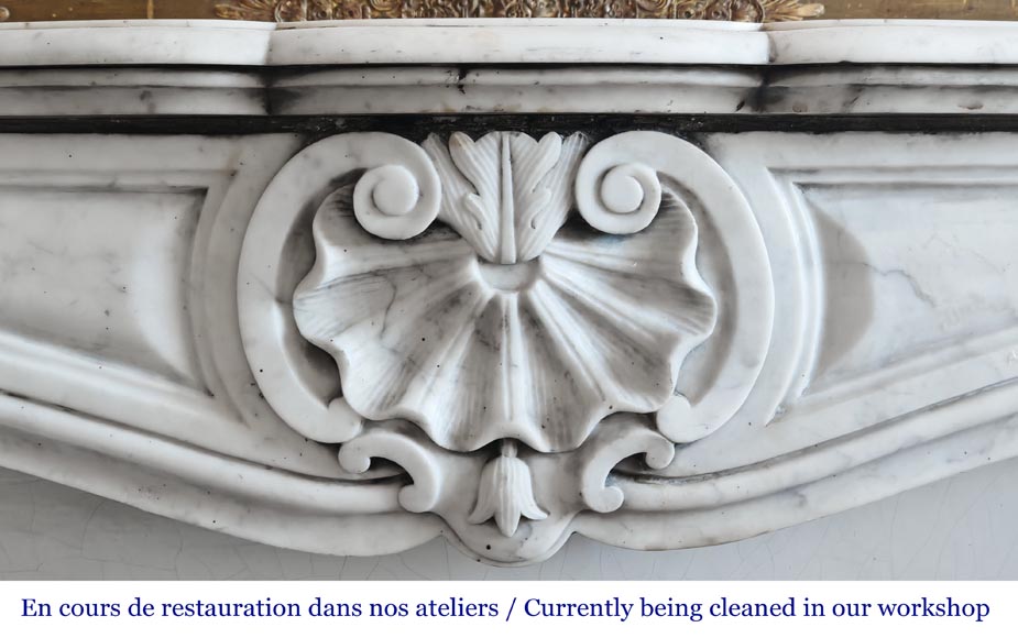 Louis XV style fireplace in Carrara marble decorated with a shell Louis XV style fireplace in Carrara marble decorated with a shell-1