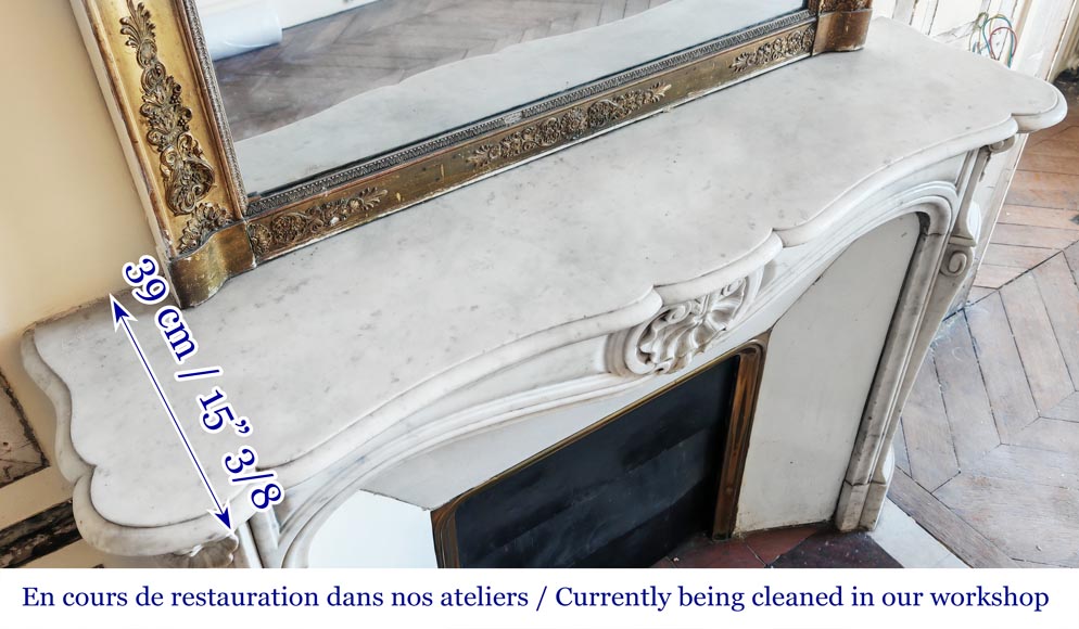 Louis XV style fireplace in Carrara marble decorated with a shell Louis XV style fireplace in Carrara marble decorated with a shell-9