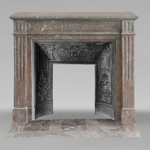 Louis XVI style fireplace with fluted feet in Enjugerais marble