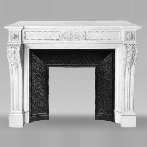 Louis XVI style fireplace in Carrara marble decorated with pearls