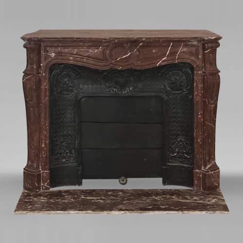 Louis XV style Pompadour model fireplace in northern red marble