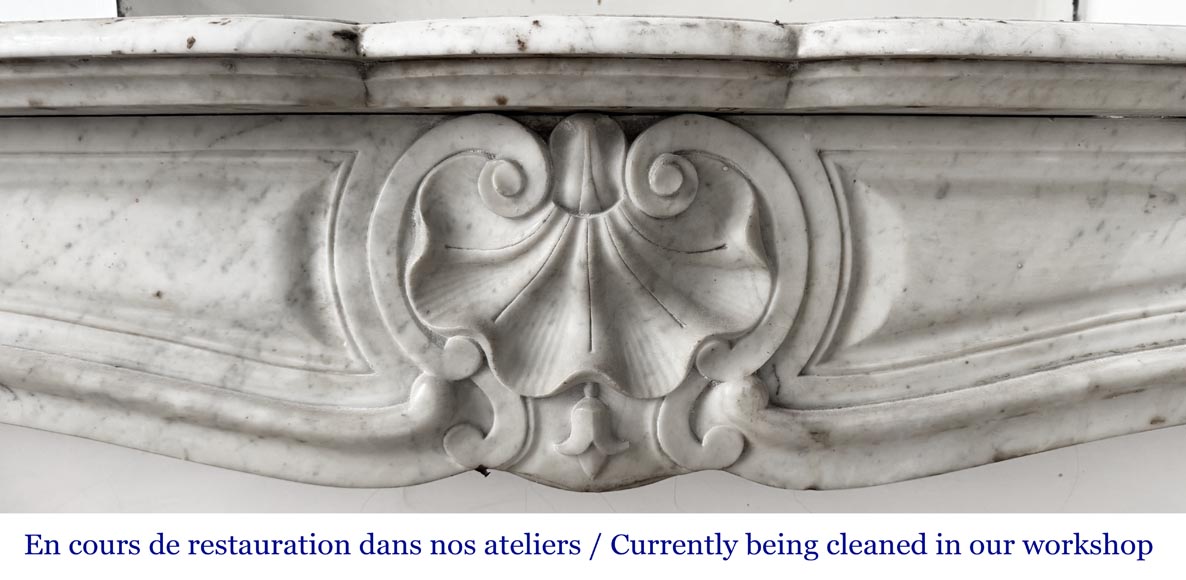 Louis XV style fireplace in Carrara marble decorated with a shell Louis XV style fireplace in Carrara marble decorated with a shell-1