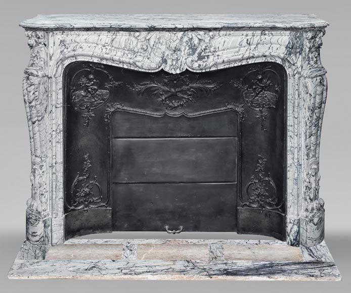 Louis XV style fireplace decorated with a shell motif, in blue floral marble Louis XV style fireplace decorated with a shell motif, in blue floral marble-0