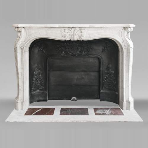 Louis XV style fireplace decorated with a palmette, in Carrara marble