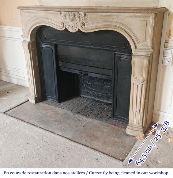 Louis XV-style stone fireplace, decorated with a shell motif. Louis XV-style stone fireplace, decorated with a shell motif.-6
