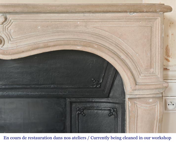 Louis XV-style stone fireplace, decorated with a shell motif. Louis XV-style stone fireplace, decorated with a shell motif.-7