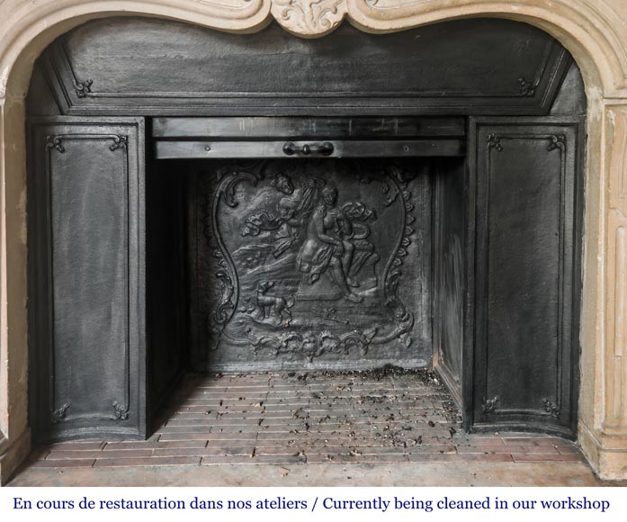Louis XV-style stone fireplace, decorated with a shell motif. Louis XV-style stone fireplace, decorated with a shell motif.-11