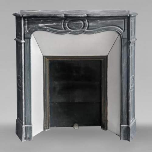 Louis XV style fireplace Pompadour model in Bleu Turquin marble