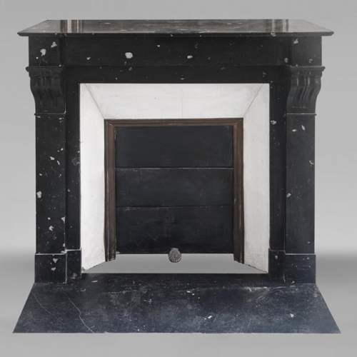 Napoleon III style fireplace, modillion type, in speckled black marble