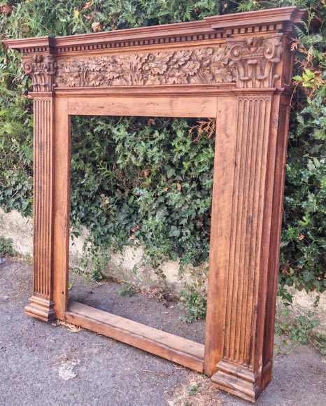 Louis XVI style oak fireplace, decorated with an oak-leaf frieze and surmounted by its oak overmantel Louis XVI style oak fireplace, decorated with an oak-leaf frieze and surmounted by its oak overmantel-16
