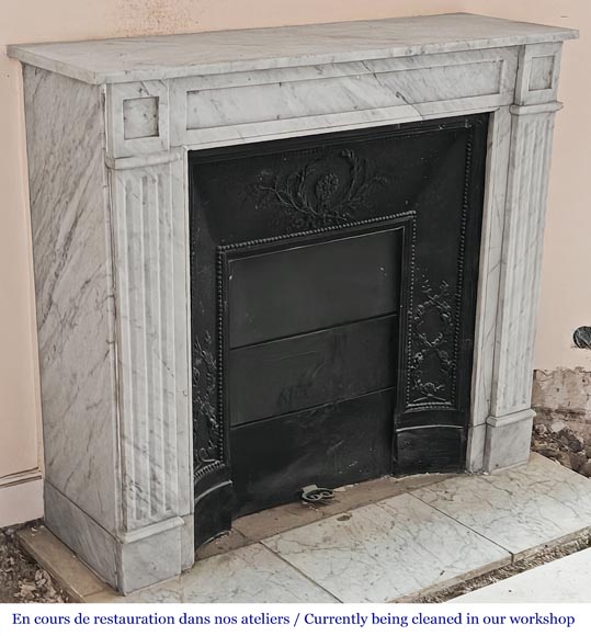 Louis XVI-style fireplace in Carrara marble, featuring molded ornamentation Louis XVI-style fireplace in Carrara marble, featuring molded ornamentation-2