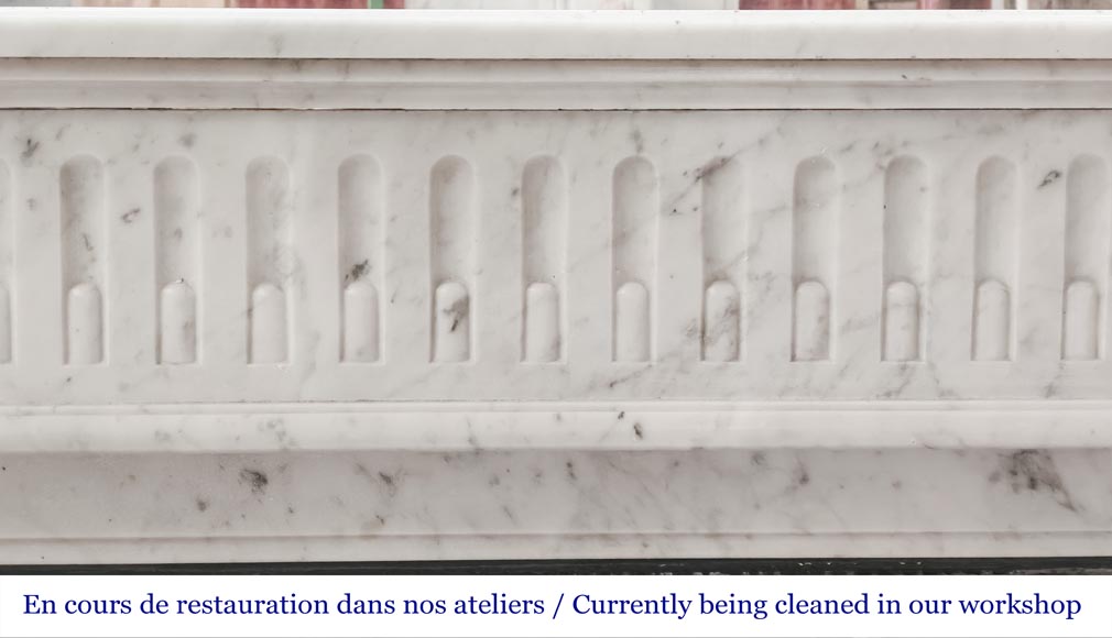Louis XVI-style Carrara marble fireplace with a fluted frieze-1