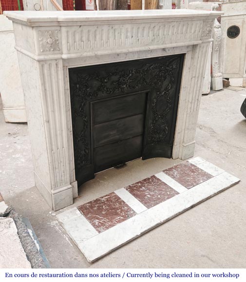 Louis XVI-style Carrara marble fireplace with a fluted frieze-2